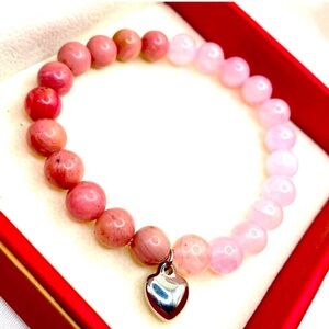 two-tone beaded bracelet featuring natural rhodonite and rose quartz gemstones